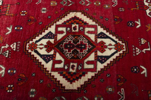 Central medallion detail of 2000s Persian Gabbeh rug from Iran / Persia