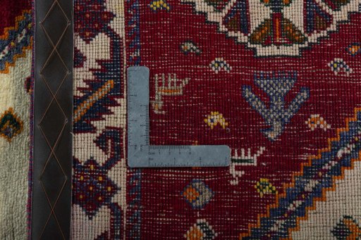 Surface texture of 2000s Persian Gabbeh rug with natural Wool and intricate pattern