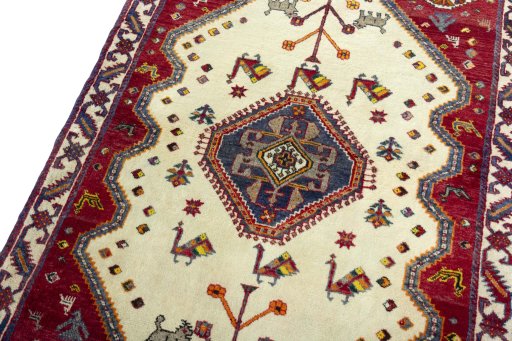 Backside of handmade 2000s Persian Gabbeh rug showing knot structure and weave density