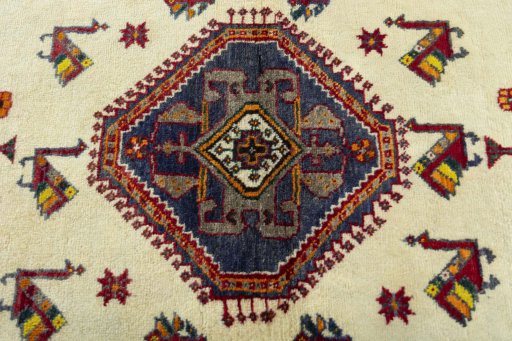 Central medallion detail of 2000s Persian Gabbeh rug from Iran / Persia