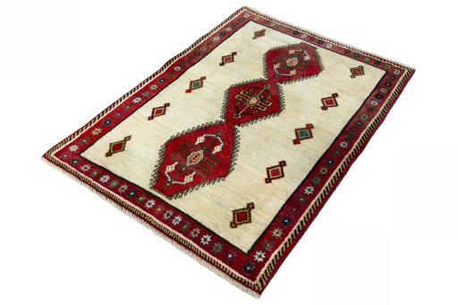 Corner detail of 2000s Persian Gabbeh rug showing border pattern and Wool pile