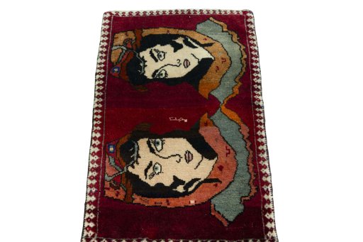 Surface texture of 2000s Persian Gabbeh rug with natural Wool and intricate pattern