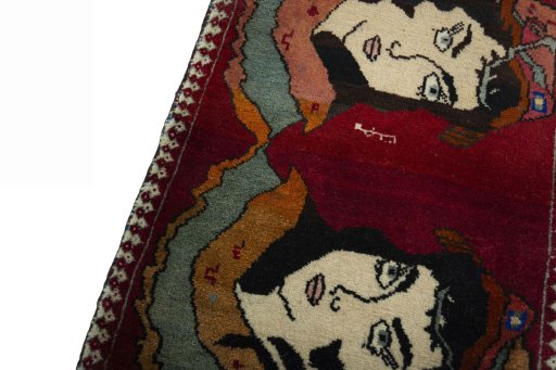 Backside of handmade 2000s Persian Gabbeh rug showing knot structure and weave density