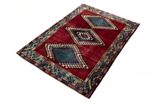 Corner detail of 2000s Persian Gabbeh rug showing border pattern and Wool pile