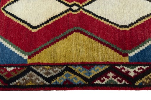 Close-up detail of 2000s Persian Gabbeh rug from Iran / Persia showing Wool weave