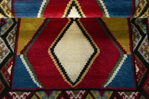 Full view of 2000s Persian Gabbeh rug from Iran / Persia, 117 × 85 cm in Multi Color tones