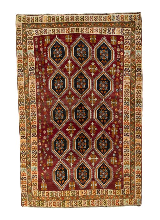 Full view of 2000s Persian Gabbeh rug from Iran / Persia, 243 × 157 cm in Red tones
