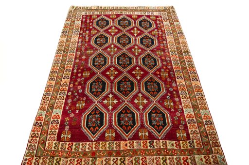 Surface texture of 2000s Persian Gabbeh rug with natural Wool and intricate pattern