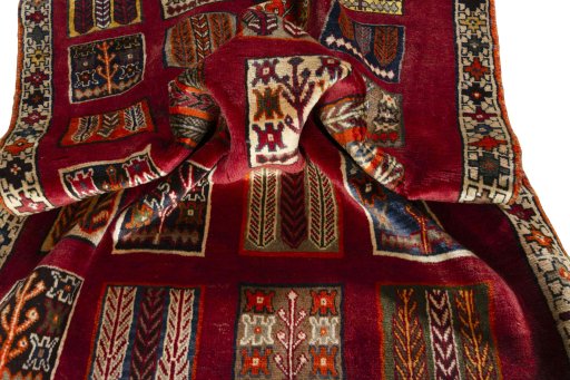 Full view of 2000s Persian Gabbeh rug from Iran / Persia, 175 × 114 cm in Red tones