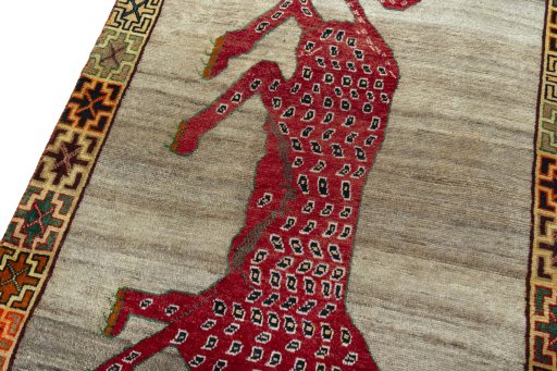 Backside of handmade 2000s Persian Gabbeh rug showing knot structure and weave density