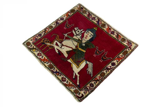 Corner detail of 2000s Persian Gabbeh rug showing border pattern and Wool pile
