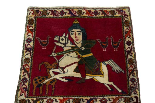 Surface texture of 2000s Persian Gabbeh rug with natural Wool and intricate pattern