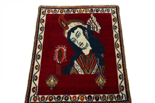 Surface texture of 2000s Persian Gabbeh rug with natural Wool and intricate pattern