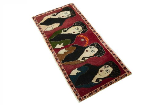 Corner detail of 2000s Persian Gabbeh rug showing border pattern and Wool pile