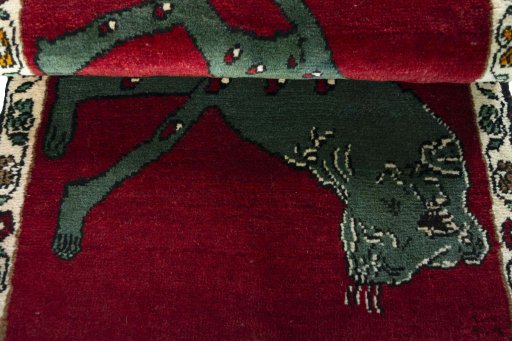 Full view of 2000s Persian Gabbeh rug from Iran / Persia, 108 × 63 cm in Red tones