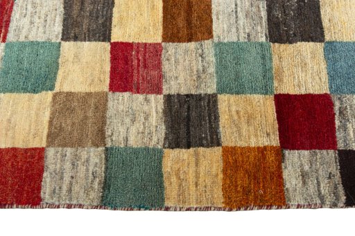 Close-up detail of 2000s Persian Gabbeh rug from Iran / Persia showing Wool weave