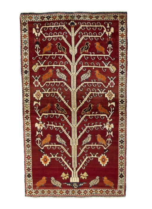 Full view of 2000s Persian Gabbeh rug from Iran / Persia, 207 × 117 cm in Red tones