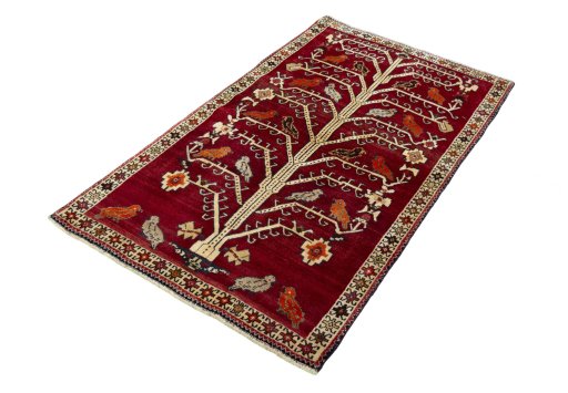 Corner detail of 2000s Persian Gabbeh rug showing border pattern and Wool pile
