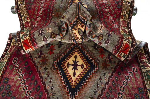 Corner detail of 2000s Persian Gabbeh rug showing border pattern and Wool pile