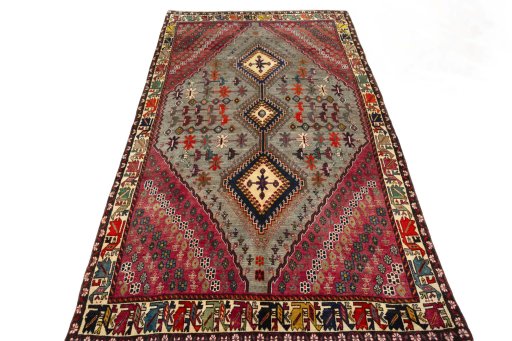 Surface texture of 2000s Persian Gabbeh rug with natural Wool and intricate pattern