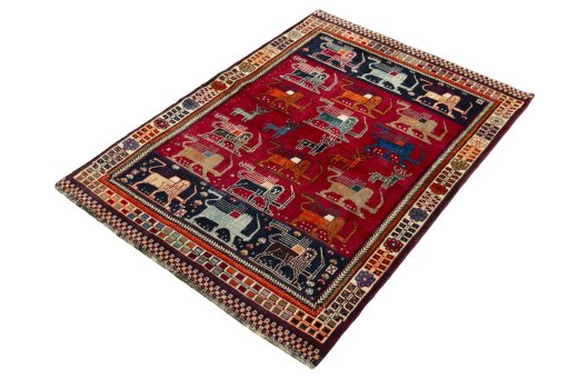 Corner detail of 2000s Persian Gabbeh rug showing border pattern and Wool pile