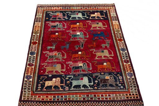 Surface texture of 2000s Persian Gabbeh rug with natural Wool and intricate pattern