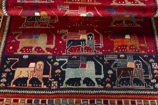 Full view of 2000s Persian Gabbeh rug from Iran / Persia, 185 × 132 cm in Red tones
