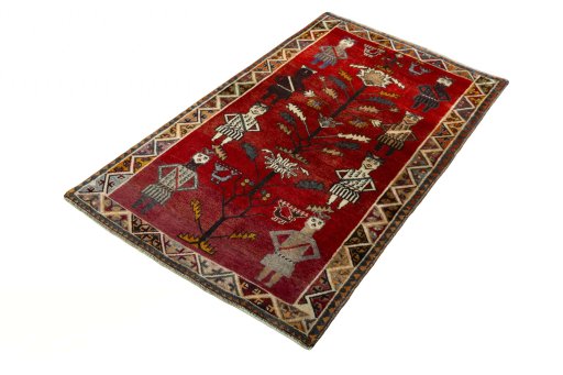 Corner detail of 2000s Persian Gabbeh rug showing border pattern and Wool pile