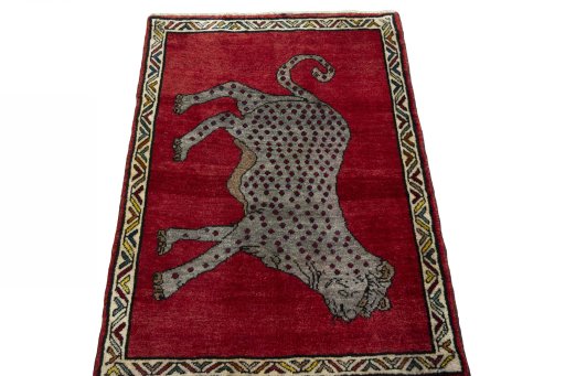 Surface texture of 2000s Persian Gabbeh rug with natural Wool and intricate pattern