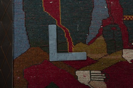 Backside of handmade 2000s Persian Gabbeh rug showing knot structure and weave density
