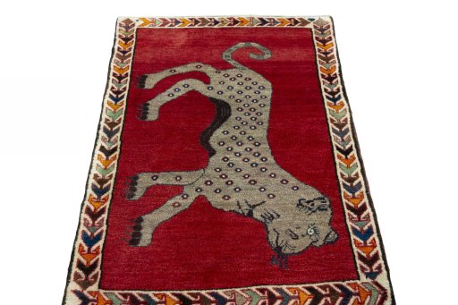 Surface texture of 2000s Persian Gabbeh rug with natural Wool and intricate pattern