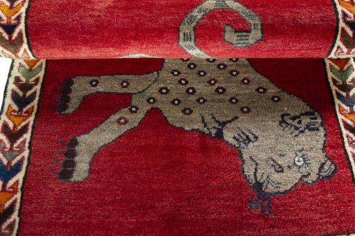 Full view of 2000s Persian Gabbeh rug from Iran / Persia, 125 × 86 cm in Red tones