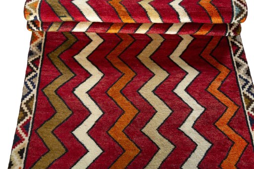 Full view of 2000s Persian Gabbeh rug from Iran / Persia, 190 × 92 cm in Red tones