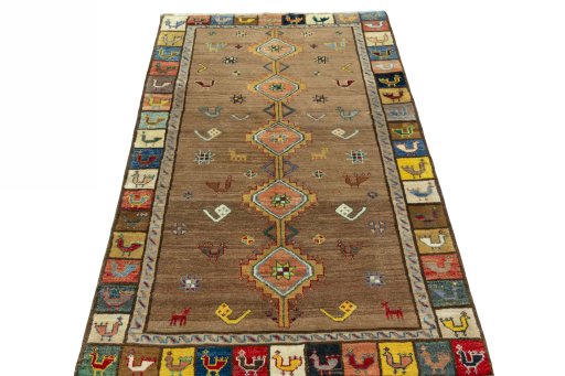 Surface texture of 2000s Persian Gabbeh rug with natural Wool and intricate pattern