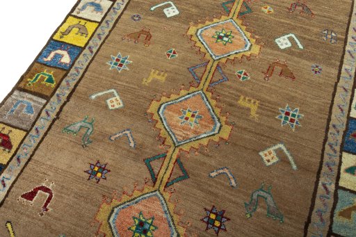 Backside of handmade 2000s Persian Gabbeh rug showing knot structure and weave density