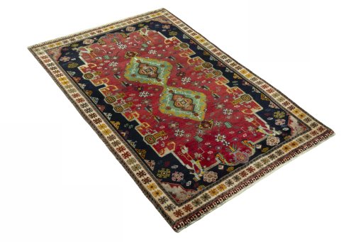 Close-up detail of 2000s Persian Gabbeh rug from Iran / Persia showing Wool weave