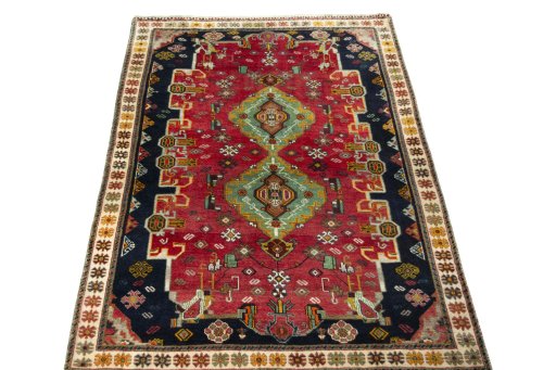 Surface texture of 2000s Persian Gabbeh rug with natural Wool and intricate pattern