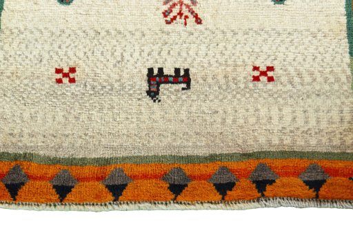 Central medallion detail of 2000s Persian Gabbeh rug from Iran / Persia