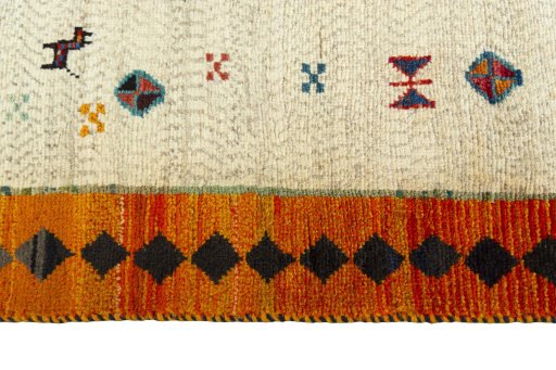 Close-up detail of 2000s Persian Gabbeh rug from Iran / Persia showing Wool weave