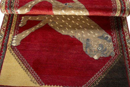 Full view of 2000s Persian Gabbeh rug from Iran / Persia, 182 × 110 cm in Red tones