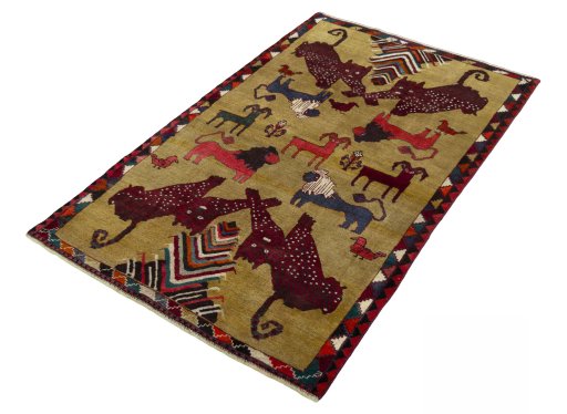 Corner detail of 2000s Persian Gabbeh rug showing border pattern and Wool pile