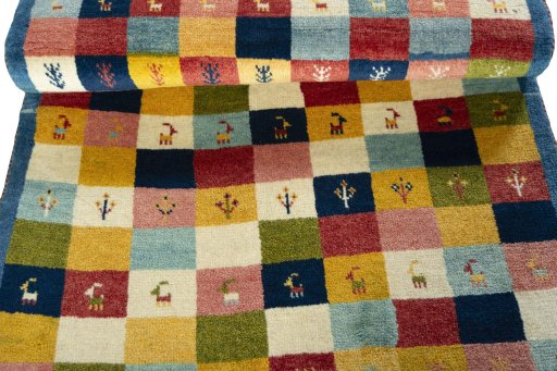 Full view of 2000s Persian Gabbeh rug from Iran / Persia, 160 × 91 cm in Multi Color tones