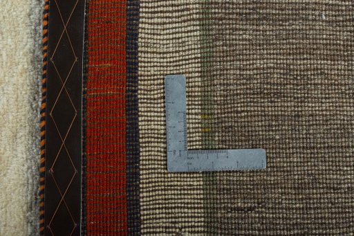 Close-up detail of 2000s Persian Gabbeh rug from Iran / Persia showing Wool weave