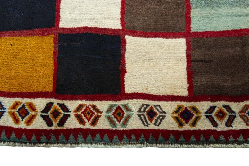 Central medallion detail of 2000s Persian Gabbeh rug from Iran / Persia