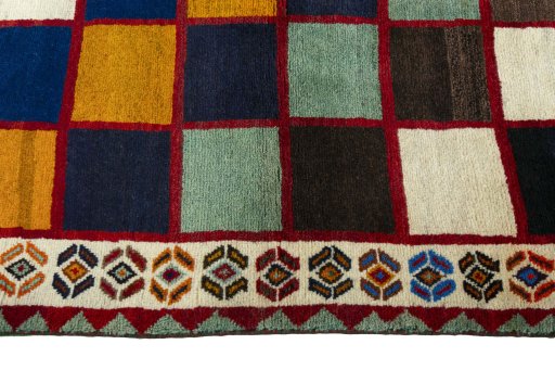 Close-up detail of 2000s Persian Gabbeh rug from Iran / Persia showing Wool weave