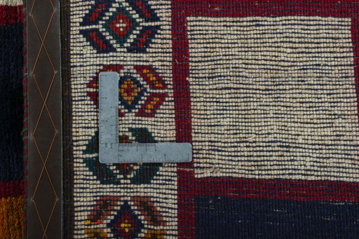 Close-up detail of 2000s Persian Gabbeh rug from Iran / Persia showing Wool weave