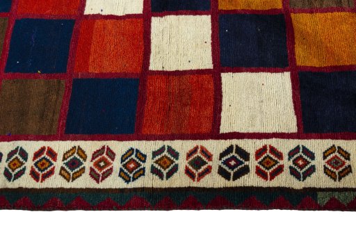 Close-up detail of 2000s Persian Gabbeh rug from Iran / Persia showing Wool weave