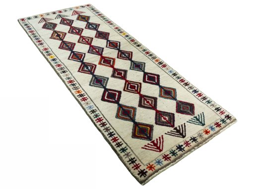Close-up detail of 2000s Persian Gabbeh rug from Iran / Persia showing Wool weave