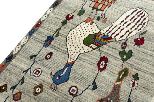 Backside of handmade 2000s Persian Gabbeh rug showing knot structure and weave density