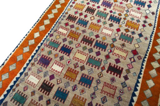 Backside of handmade 2000s Persian Gabbeh rug showing knot structure and weave density